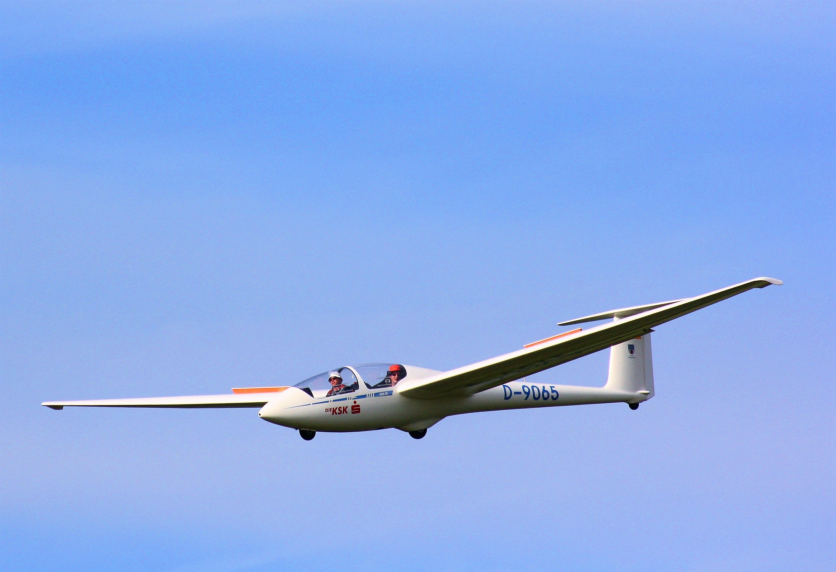glider soaring in the sky